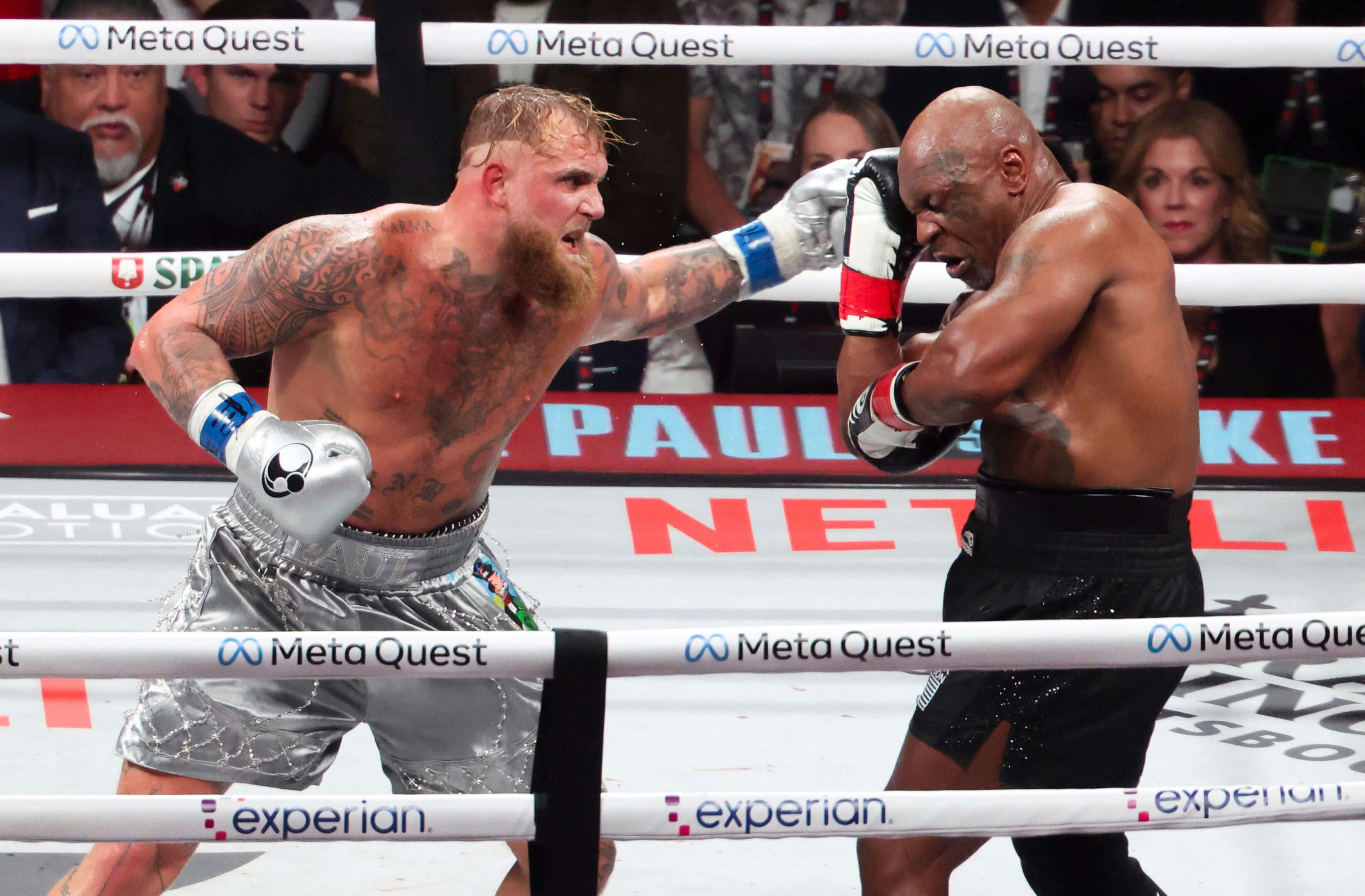 Mike Tyson (black gloves) fights Jake Paul (silver gloves) at AT&T Stadium. Mandatory Credit: Kevin Jairaj-Imagn Images