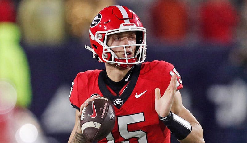 Georgia Bulldogs quarterback Carson Beck in NCAAF action.