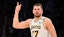 Los Angeles Lakers guard Luka Doncic (77) reacts after scoring.