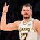 Los Angeles Lakers guard Luka Doncic (77) reacts after scoring.