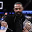 UFC mixed martial arts heavyweight champion Jon Jones poses for a photo before a game between the New York Knicks and the Chicago Bulls at Madison Square Garden.
