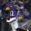 Baltimore Ravens running back Derrick Henry rushes the ball.