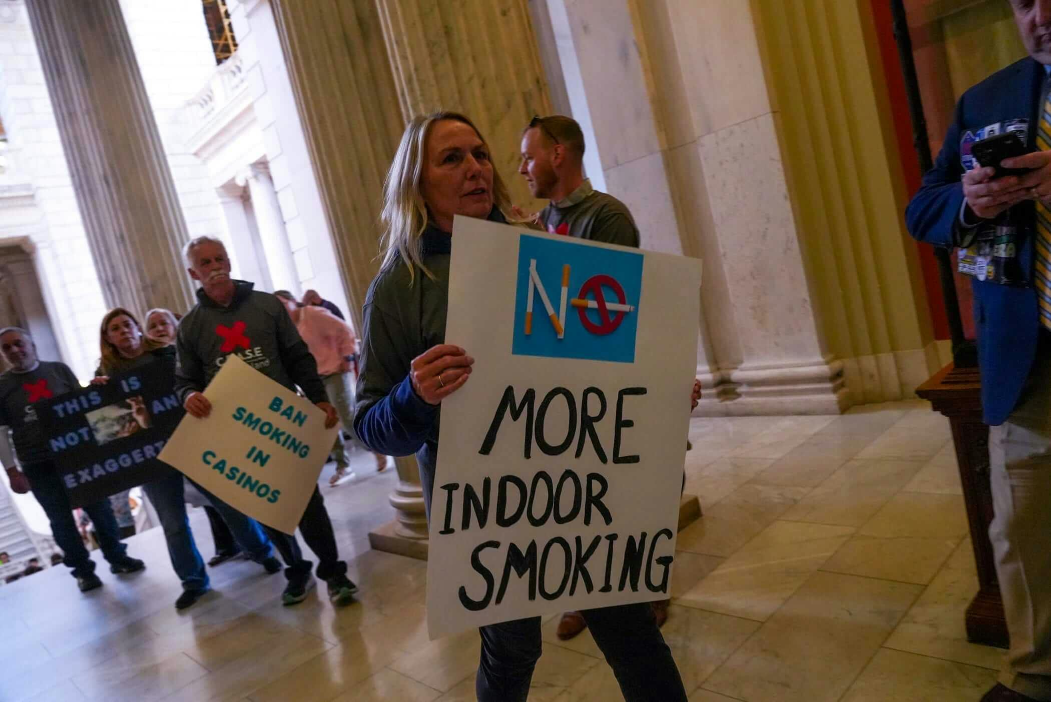 Casino workers rally at in May to push for a smoking ban at casinos. David DelPoio/The Providence Journal / USA TODAY NETWORK via Imagn Images