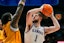 Kansas Jayhawks center Hunter Dickinson (1) shoots against Iowa State Cyclones guard Demarion Watson (4) during the second half at Allen Fieldhouse. Mandatory Credit: Jay Biggerstaff-Imagn Images