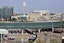 Cars wait in line at the Rainbow International Bridge in Niagara Falls on Monday, Aug. 9, 2021 to cross into Canada. The Canadian border opened up to vaccinated Americans on Monday for non-essential travel. canada