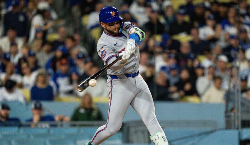 New York Mets shortstop Bo Bichette (19) bats during a MLB game.
