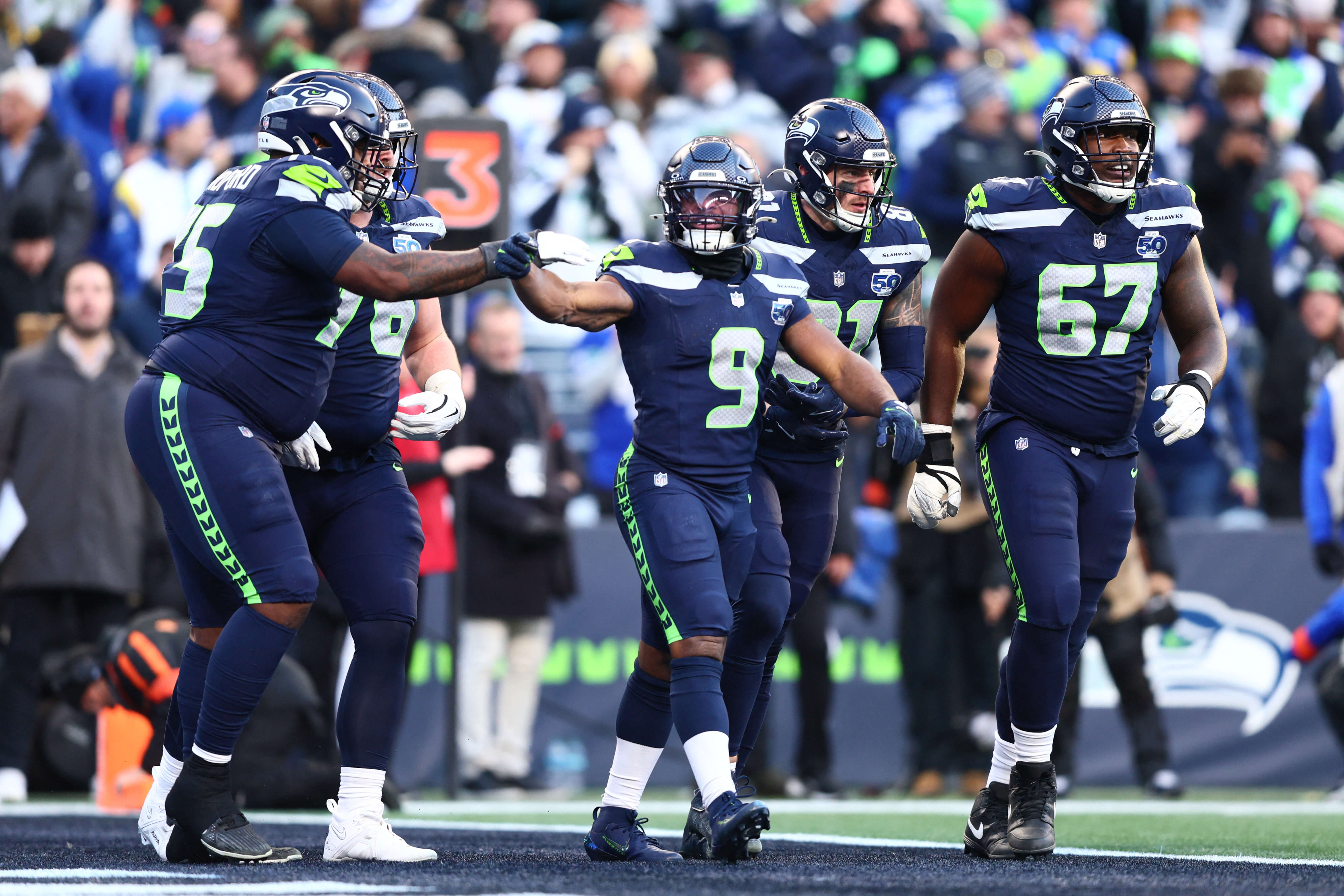 Seattle Seahawks running back Kenneth Walker III (9) celebrates after running for a touchdown in the first half against the Los Angeles Rams in the 2026 NFC Championship Game at Lumen Field. Kevin Ng-Imagn Images