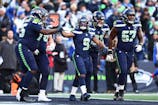 Seattle Seahawks running back Kenneth Walker III (9) celebrates after running for a touchdown in the first half against the Los Angeles Rams in the 2026 NFC Championship Game at Lumen Field. Kevin Ng-Imagn Images