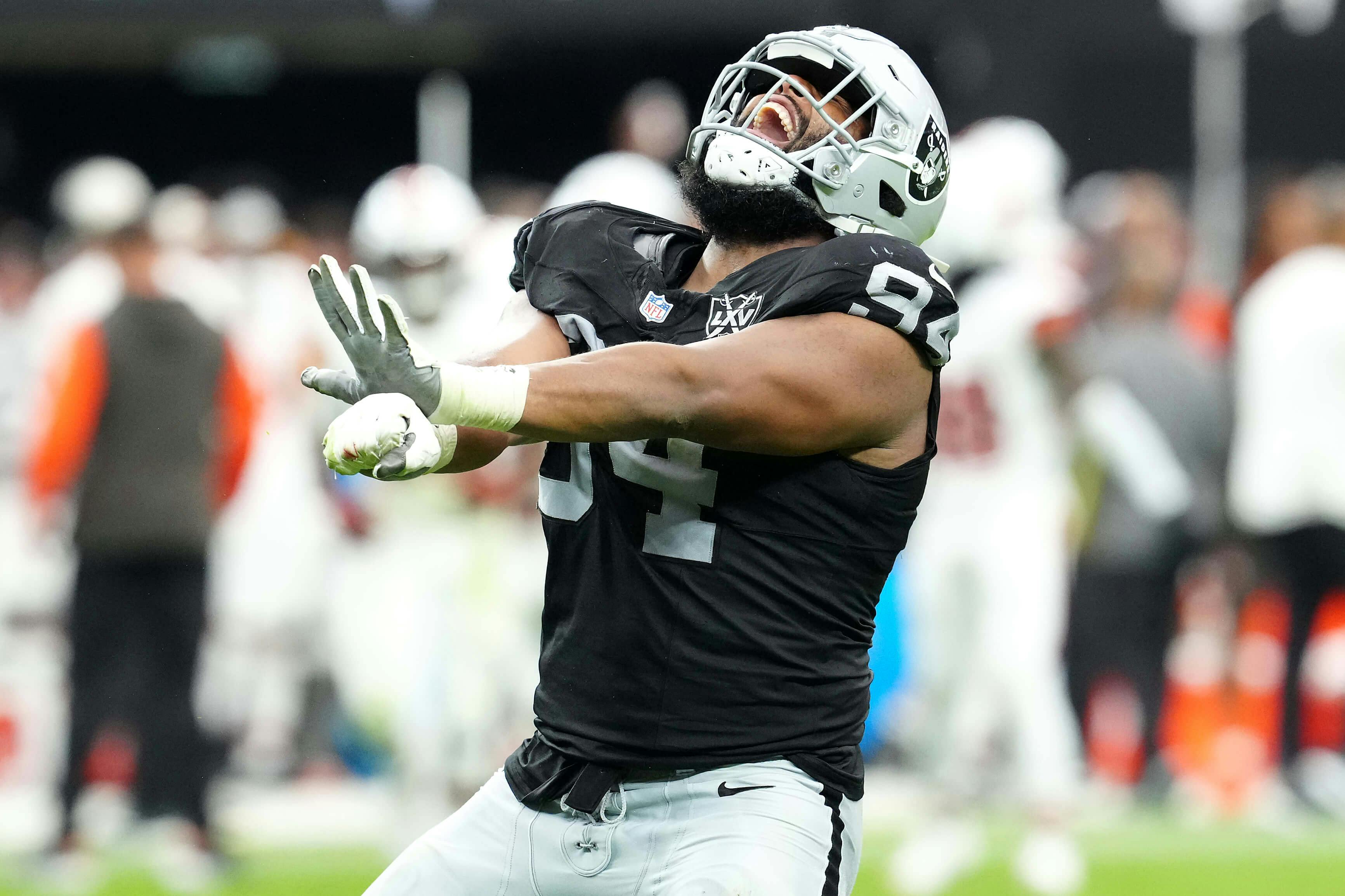 Las Vegas Raiders defensive tackle Christian Wilkins (94) celebrates after getting a sack against the Cleveland Browns during the third quarter at Allegiant Stadium. Mandatory Credit: Stephen R. Sylvanie-Imagn Images