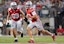 Ohio State Buckeyes quarterback Julian Sayin (10) scrambles in front of tight end Will Kacmarek (89).