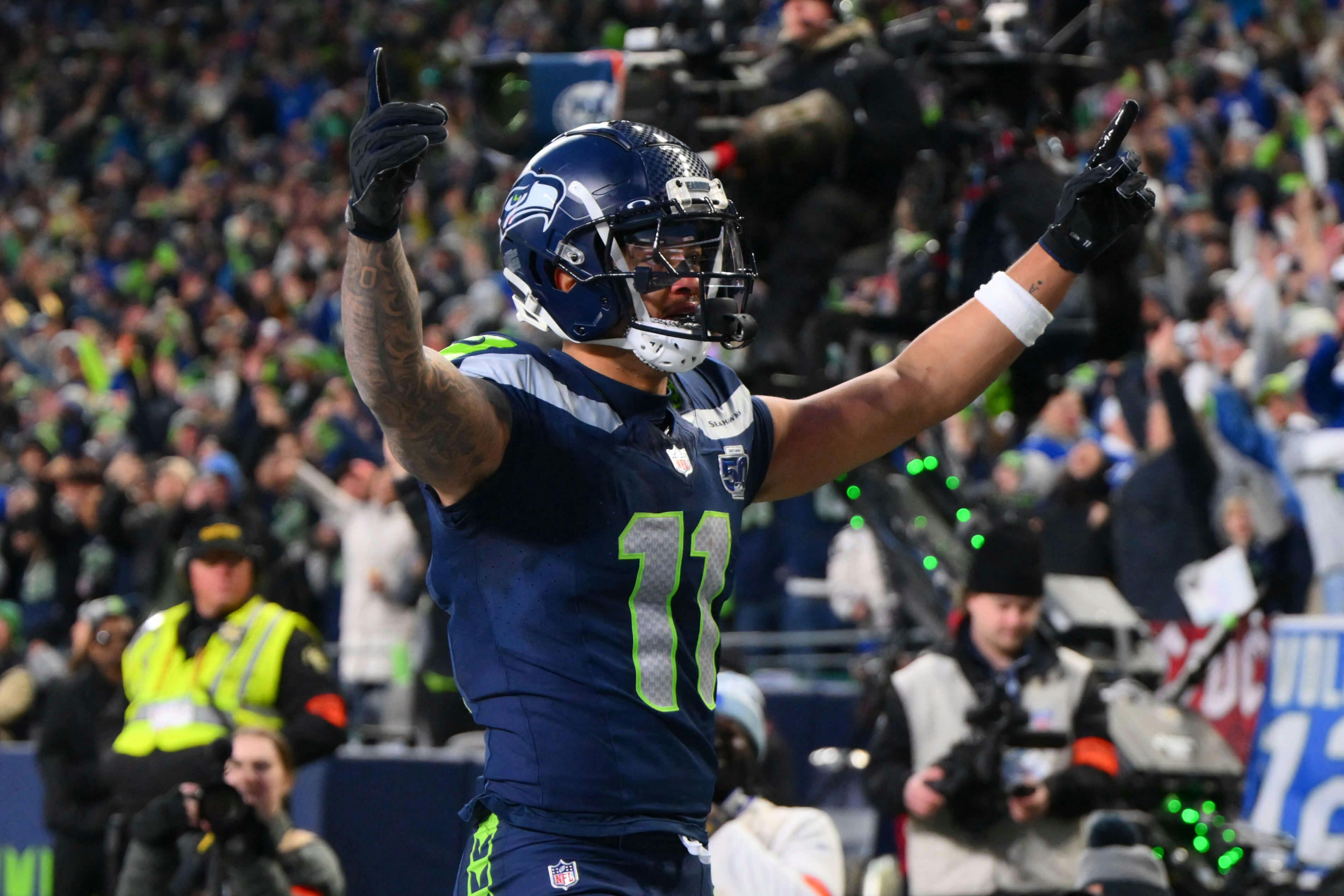 Seattle Seahawks wide receiver Jaxon Smith-Njigba (11) celebrates after scoring a touchdown against the Los Angeles Rams during the first half in the 2026 NFC Championship Game at Lumen Field. Steven Bisig-Imagn Images