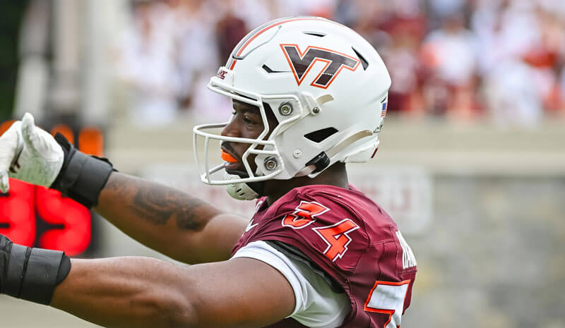 Virginia Tech Hokies defensive end Cortez Harris (34) celebrates a sack.