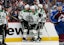 Dallas Stars left wing Jamie Benn (14) celebrates his goal scored with center Tyler Seguin (91) and defenseman Thomas Harley (55) and defenseman Miro Heiskanen (4) in the third period against the Colorado Avalanche in game six.