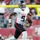Atlanta Falcons quarterback Michael Penix Jr. (9) runs with the ball.