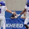 Boise State Broncos running back Dylan Riley (24) celebrates with quarterback Maddux Madsen.