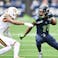 Seattle Seahawks wide receiver Jaxon Smith-Njigba (11) carries the ball after a catch against the New Orleans Saints.