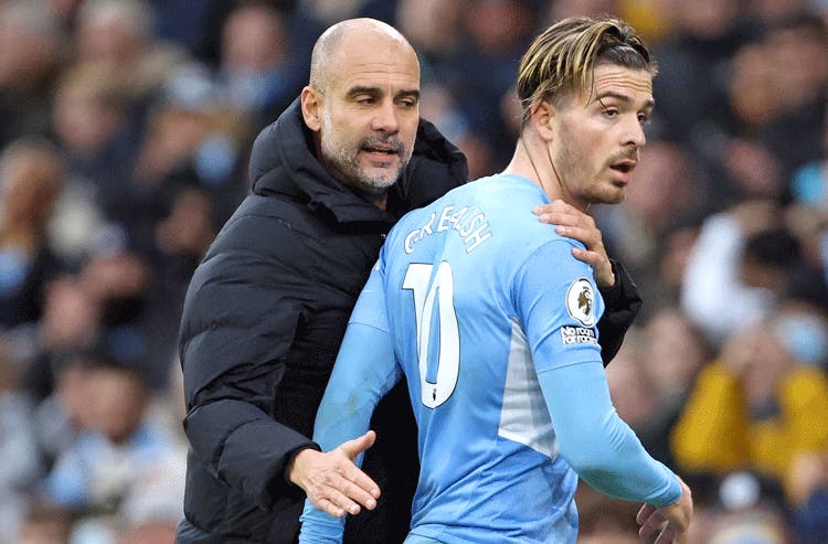 Pep Guardiola and Jack Grealish