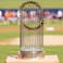 The World Series trophy sits atop home plate prior to the game between the New York Mets and the Houston Astros at The Ballpark of the Palm Beaches.