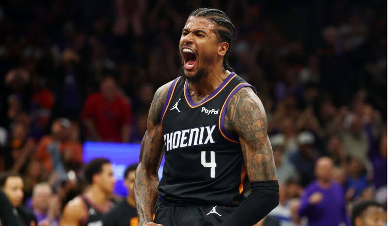 Phoenix Suns guard Jalen Green (4) celebrates after a slam dunk.