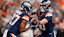 Denver Broncos quarterback Bo Nix (10) hands the ball off to Denver Broncos running back J.K. Dobbins (27) during the third quarter against the Cincinnati Bengals at Empower Field at Mile High.