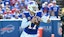 Buffalo Bills quarterback Josh Allen (17) runs in the pocket.