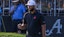 Jon Rahm of the Legion XIII pumps his fist after finishing the 18th hole during the final round of the LIV Golf Chicago tournament.