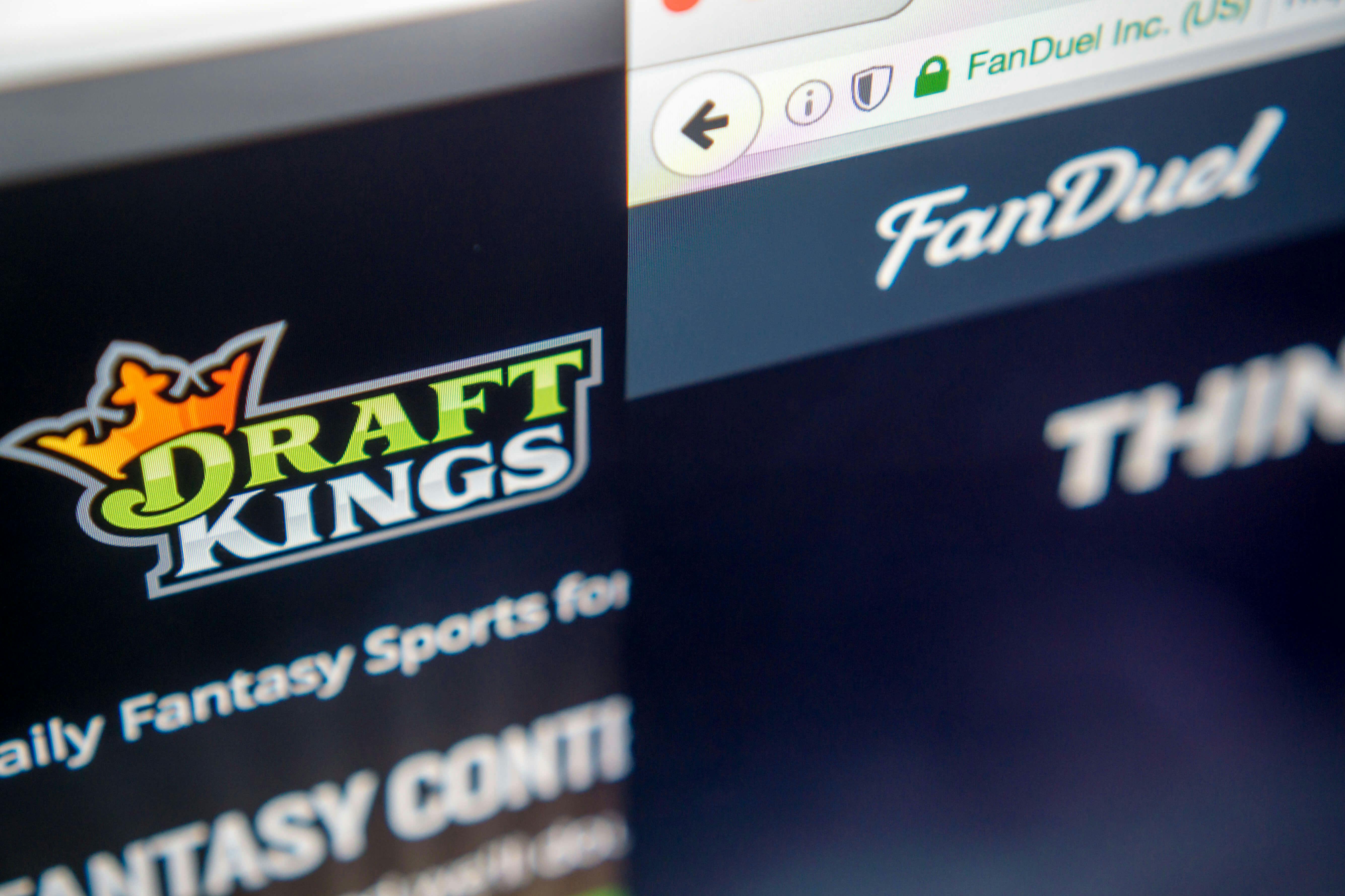 The websites of the fantasy sports sites DraftKings and FanDuel are seen on a computer screen. (Photo by Richard B. Levine)