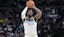 Minnesota Timberwolves forward Julius Randle (30) shoots a three point basket against the Denver Nuggets