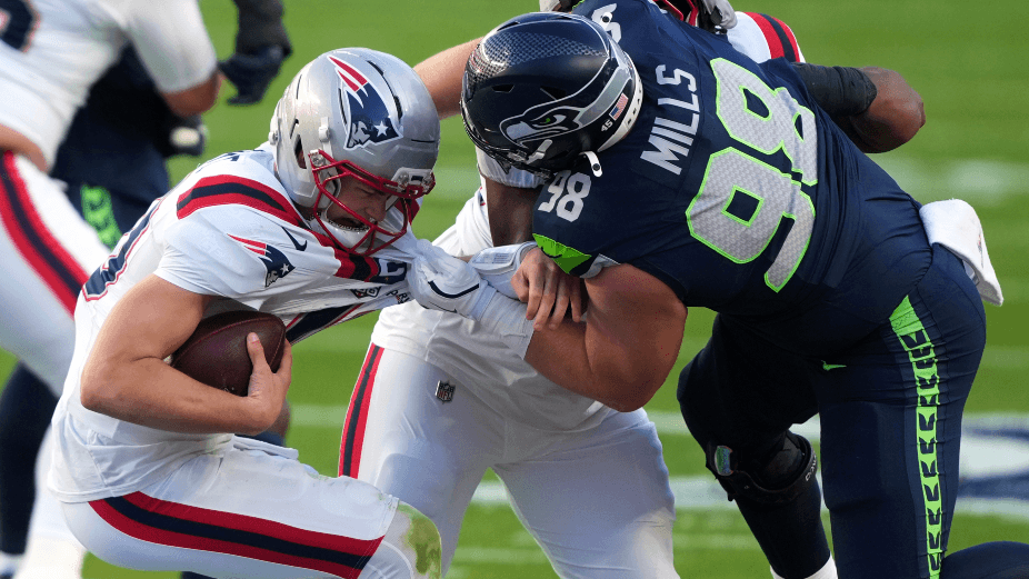 New England Patriots QB Drake Maye is sacked by Seattle Seahawks DT Rylie Mills NFL.