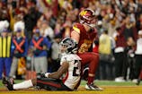 Washington Commanders tight end Zach Ertz (86) celebrates after scoring the game winning touchdown in front of Atlanta Falcons cornerback Dee Alford (20) during overtime at Northwest Stadium. Mandatory Credit: Amber Searls-Imagn Images