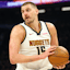 Nikola Jokic (15) against the Phoenix Suns at Mortgage Matchup Center.