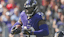 Baltimore Ravens running back Derrick Henry carries the ball.