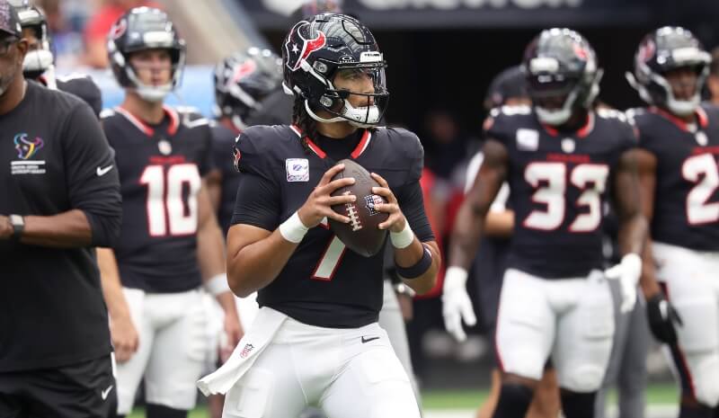 Houston Texans quarterback CJ. Stroud (7) warms up.