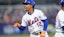New York Mets infielder Francisco Lindor (12) reacts after hitting a single.