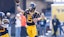 West Virginia Mountaineers quarterback Scotty Fox Jr. (15) throws a pass.