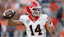 Georgia Bulldogs quarterback Gunner Stockton (14) warms up before the game against the Auburn Tigers at Jordan-Hare Stadium.