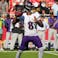 Baltimore Ravens quarterback Lamar Jackson (8) throws a pass.