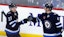 Winnipeg Jets left wing Nikolaj Ehlers (27) celebrates his third period goal with Winnipeg Jets defenseman Neal Pionk (4)