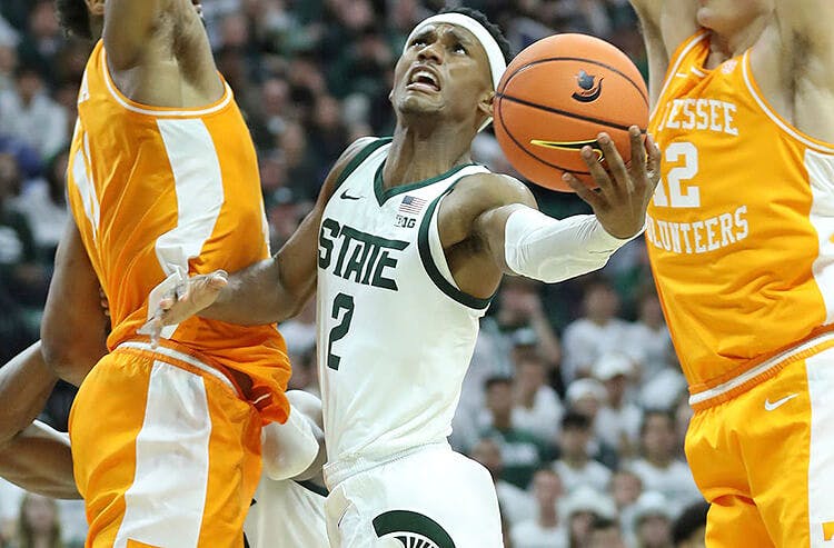 Michigan State Spartans guard Tyson Walker in NCAA college basketball action.