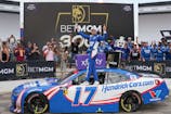 William Byron (17) takes the win during the BetMGM 300 at Charlotte Motor Speedway. Jim Dedmon-Imagn Images