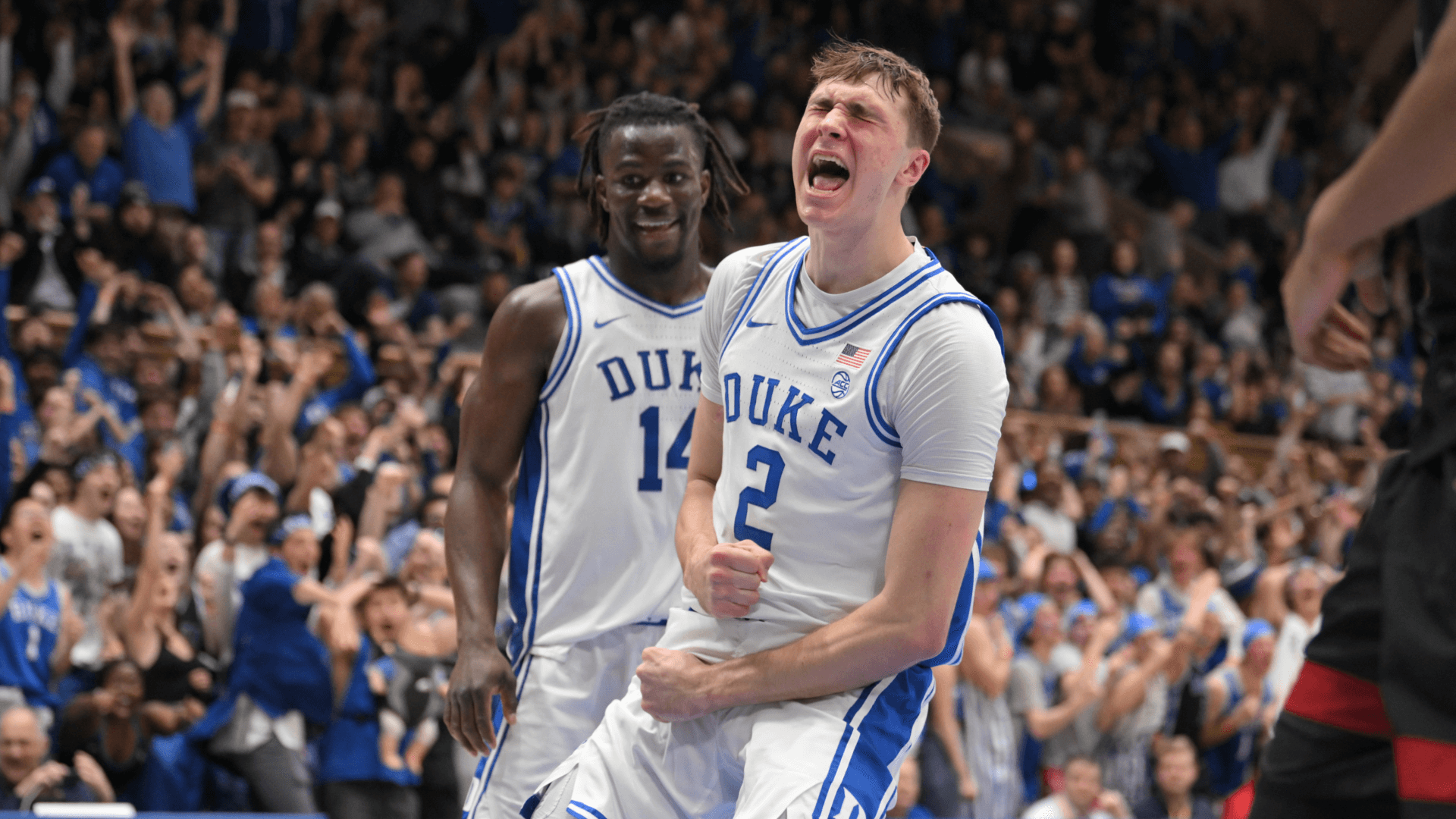 Duke Blue Devils forward Cooper Flagg (2) celebrating after dunking against the Stanford Cardinal.