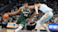 Milwaukee Bucks forward Giannis Antetokounmpo (34) drives for the basket against San Antonio Spurs forward Victor Wembanyama (1).