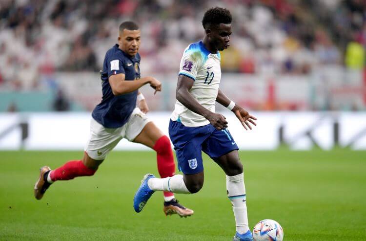 France forward Kylian Mbapp (10) chases down England forward Bukayo Saka