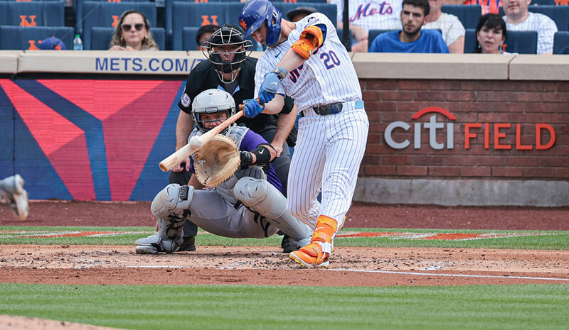 New York Mets first baseman Pete Alonso (20) hits a two run home run during the fourth inning against Colorado Rockies starting pitcher German Marquez (48) at Citi Field.