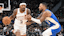 Phoenix Suns guard Bradley Beal (3) drives against Milwaukee Bucks guard Damian Lillard (0).
