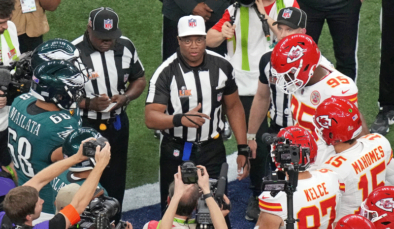 The captains for the Philadelphia Eagles and Kansas City Chiefs participate in the coin toss before Super Bowl LIX at Caesars Superdome.