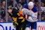 Edmonton Oilers forward Corey Perry (90) checks Vancouver Canucks defenseman Derek Forbort (27) in the first period at Rogers Arena. Mandatory Credit: Bob Frid-Imagn Images