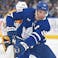 Toronto Maple Leafs forward John Tavares (91) skates with the puck against the Nashville Predators in the first period at Scotiabank Arena.