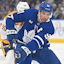 Toronto Maple Leafs forward John Tavares (91) skates with the puck against the Nashville Predators in the first period at Scotiabank Arena.