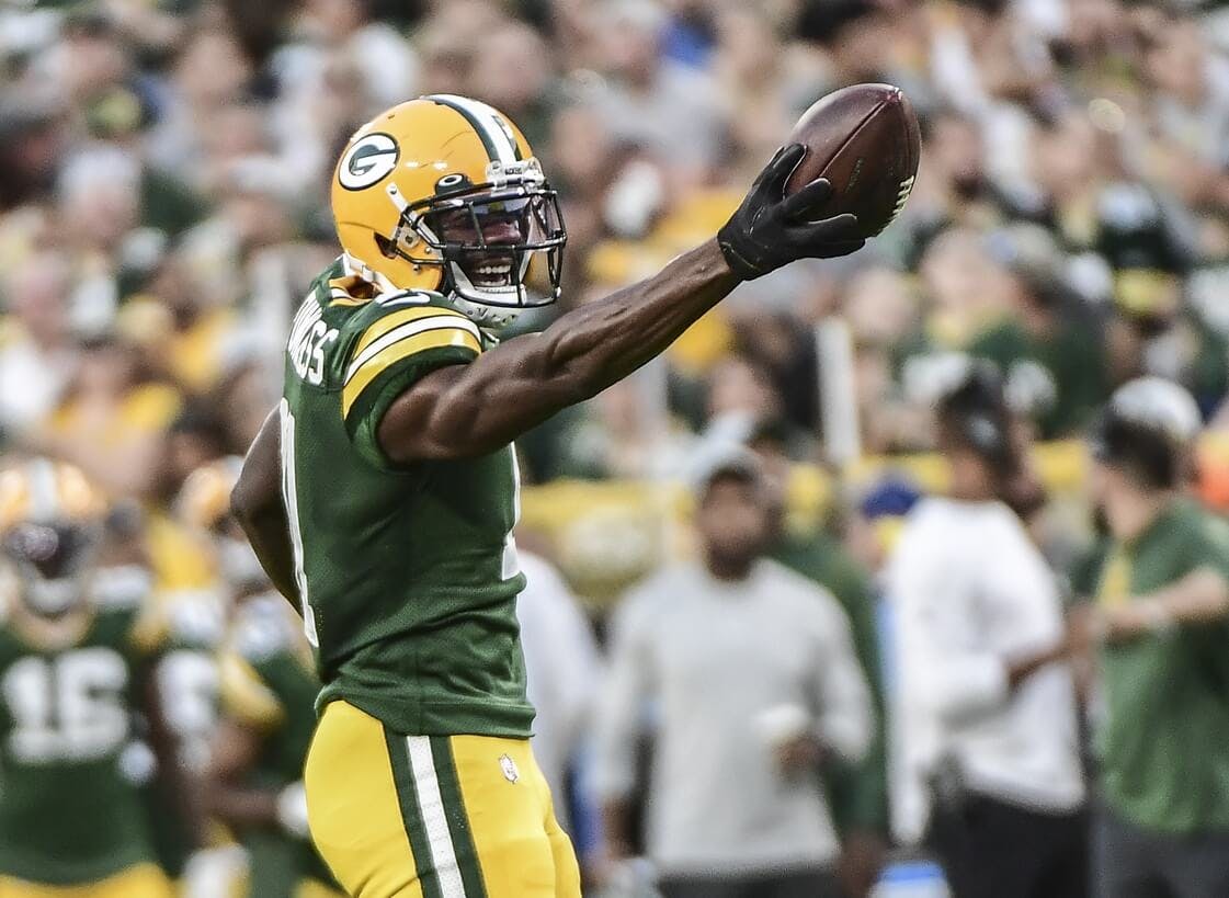 Green Bay Packers wide receiver Devin Funchess (11) reacts after picking up a first down against the Houston Texans in the first quarter at Lambeau Field.
